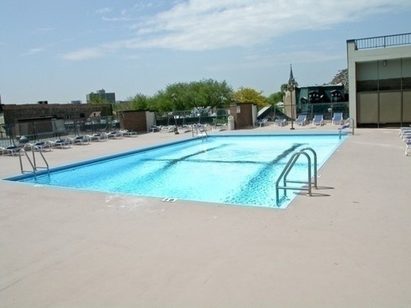 1850 North Clark Street, Unit 503 Chicago, IL 60614 - Photo 24 of 24 a view of a swimming pool with a lawn chairs