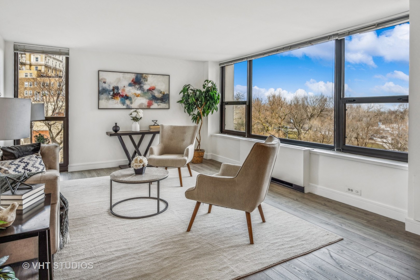 1850 North Clark Street, Unit 503 Chicago, IL 60614 - Photo 4 of 24 a living room with furniture and a large window