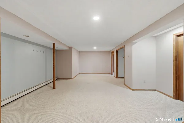 a view of empty room with closet