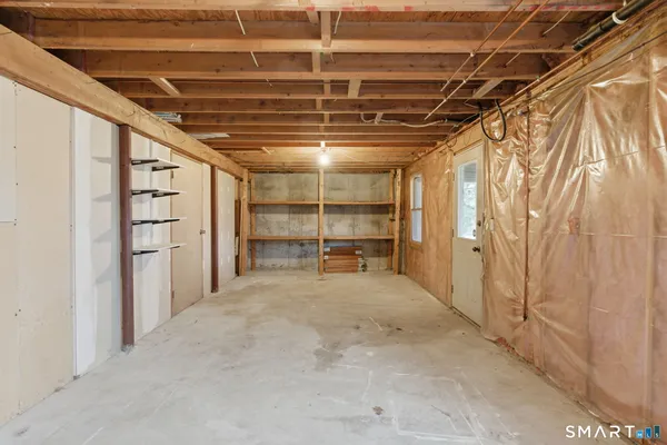 a view of empty room with windows