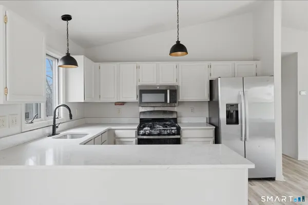 a view interior of the house and kitchen view