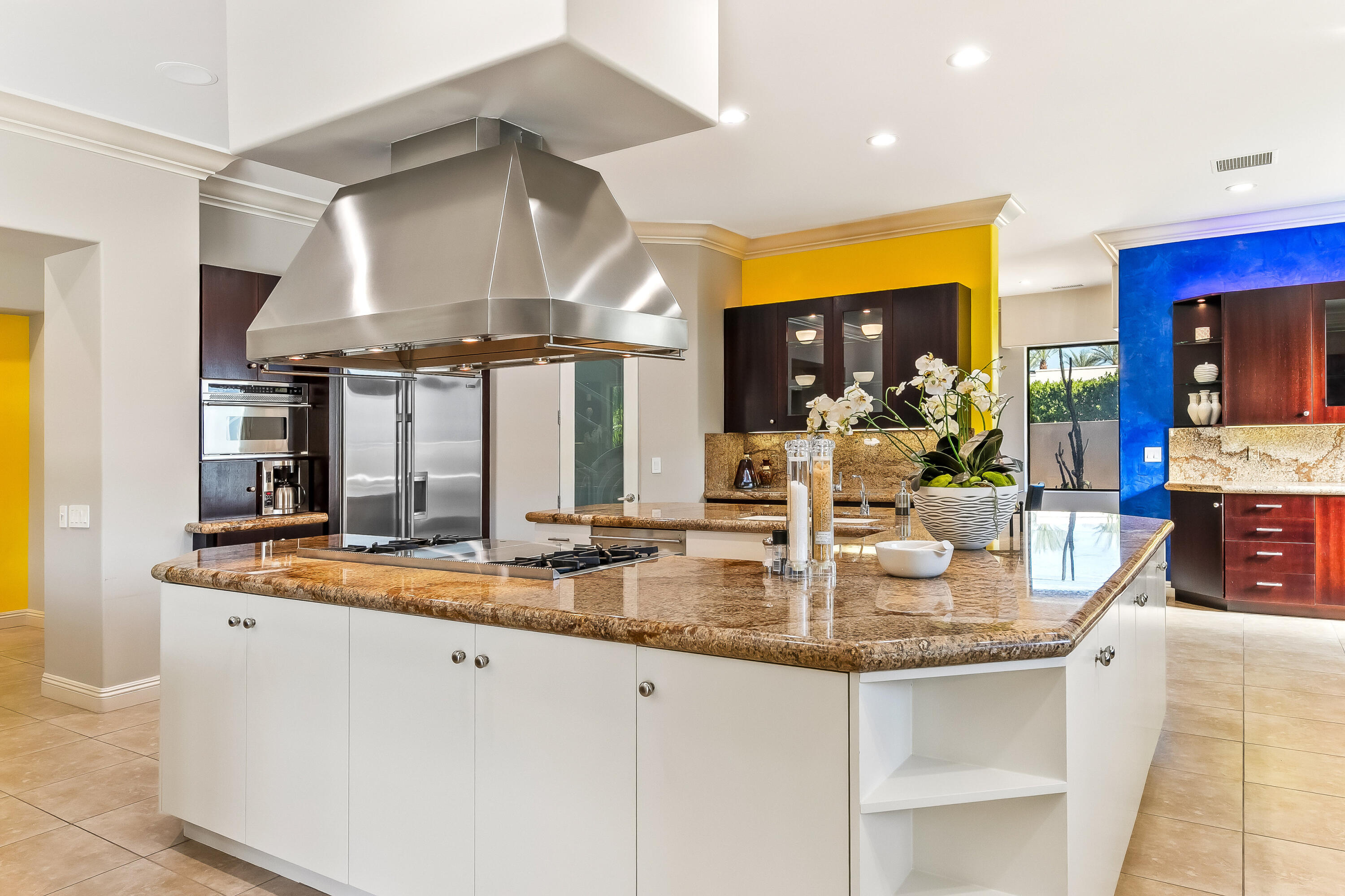 15 Sun Ridge Circle Rancho Mirage, CA 92270 - Photo 14 of 53 a kitchen with sink stove and cabinets
