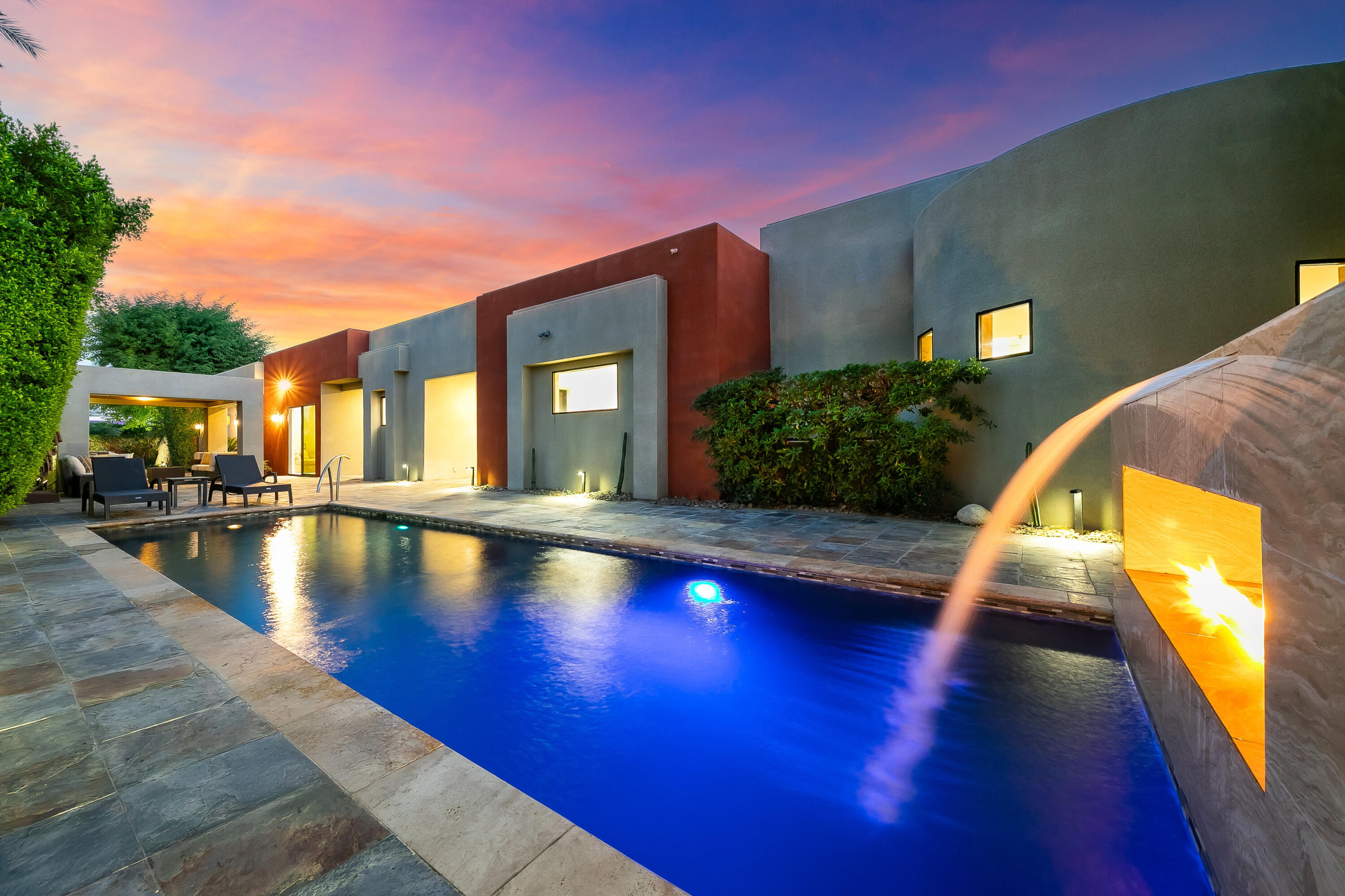 15 Sun Ridge Circle Rancho Mirage, CA 92270 - Photo 3 of 53 a view of a swimming pool with lounge chair