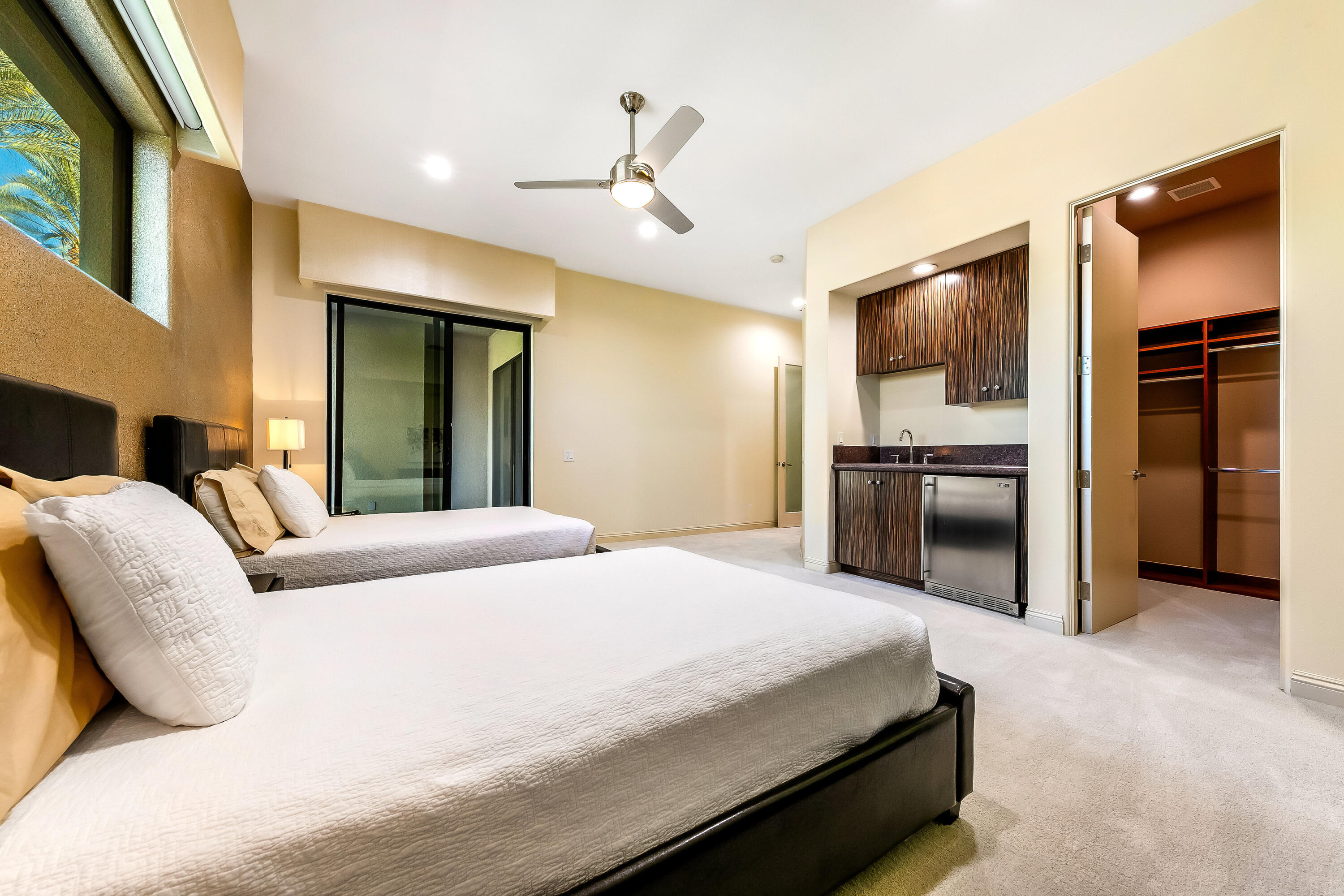 15 Sun Ridge Circle Rancho Mirage, CA 92270 - Photo 41 of 53 a bedroom with a bed and a television