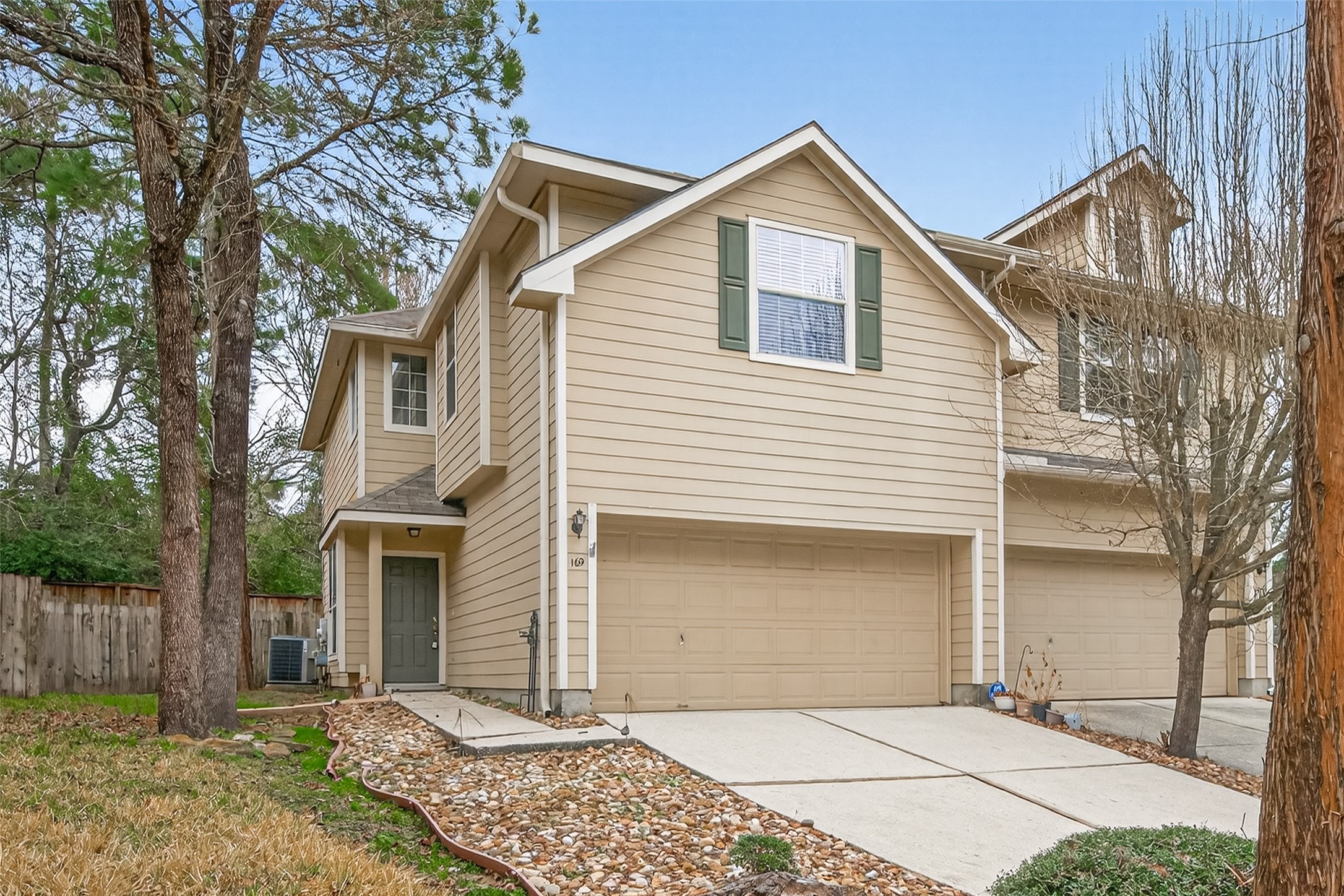 169 Musewood Court Spring, TX 77382 - Photo 2 of 44 a front view of a house with a yard