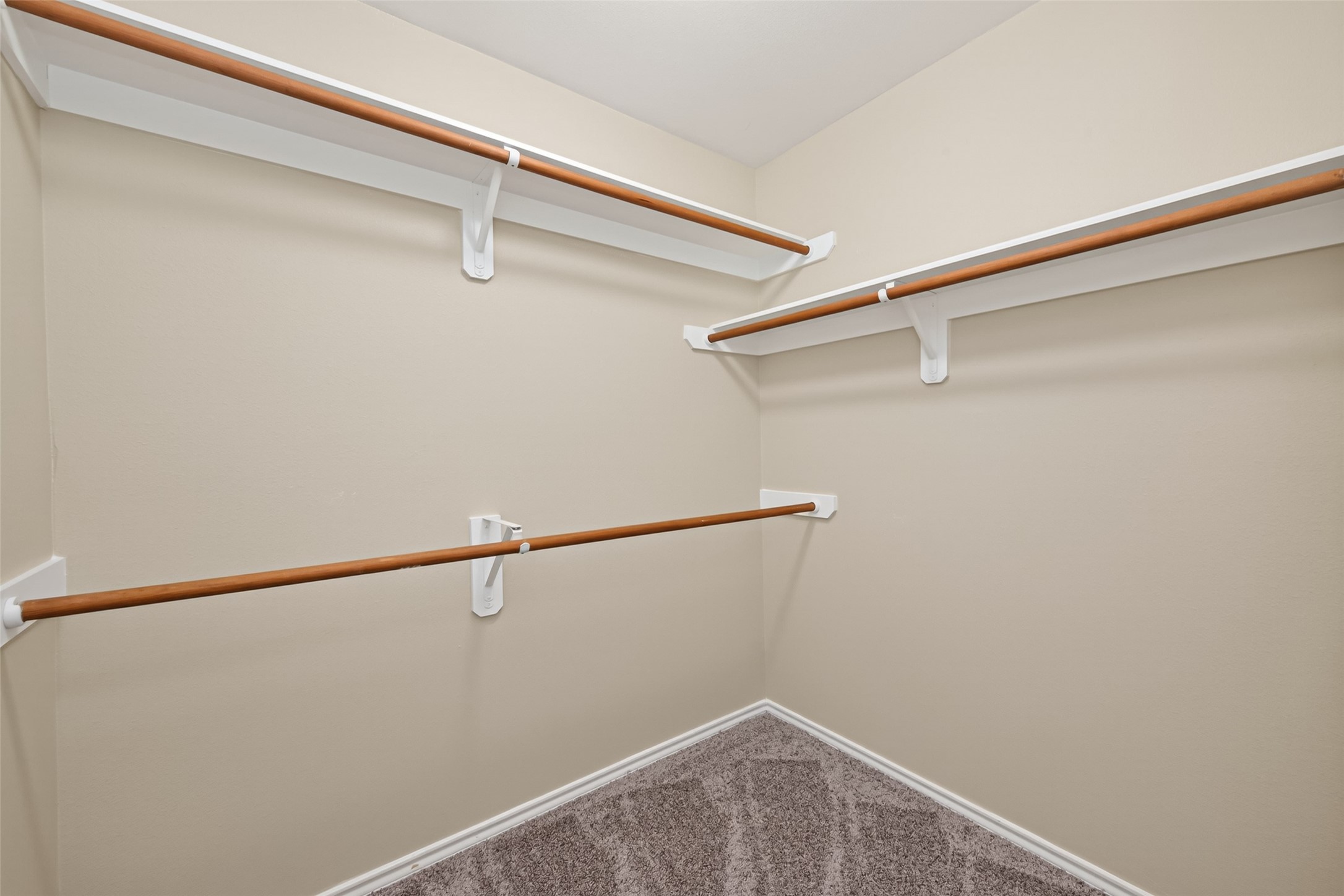 169 Musewood Court Spring, TX 77382 - Photo 28 of 44 a view of small space with racks on the wall
