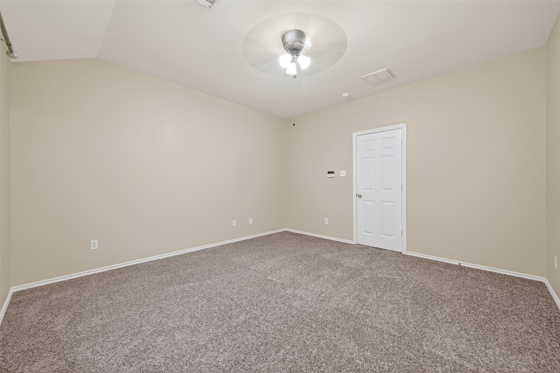 169 Musewood Court Spring, TX 77382 - Photo 35 of 44 an empty room with a chandelier fan and windows