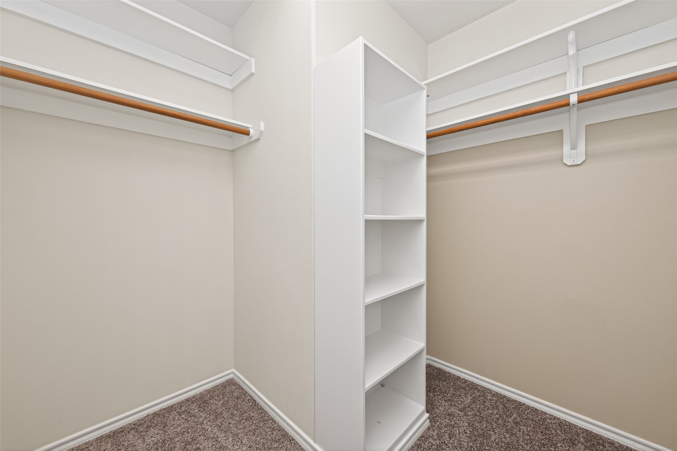 169 Musewood Court Spring, TX 77382 - Photo 41 of 44 a view of walk in closet with empty racks