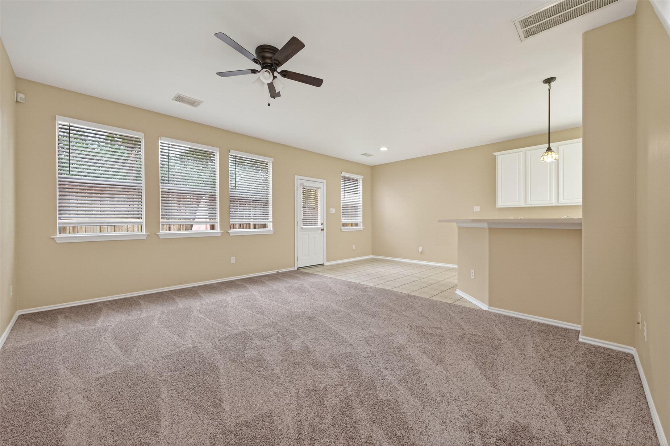 169 Musewood Court Spring, TX 77382 - Photo 6 of 44 a view of an empty room with a window