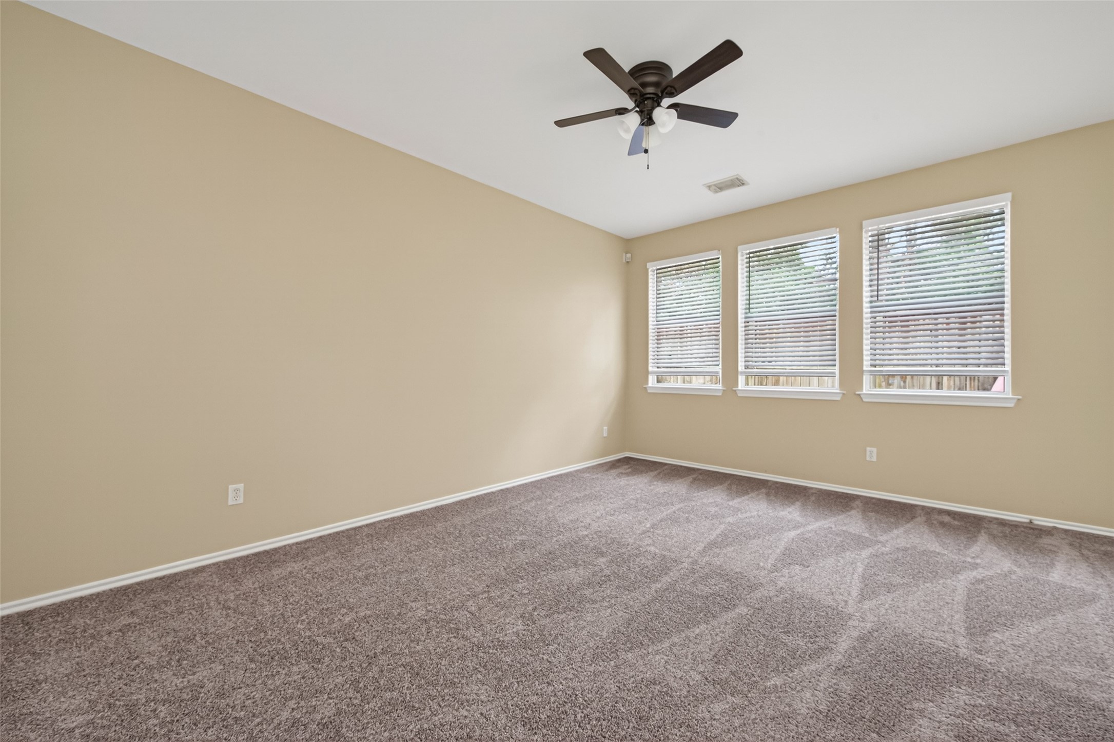 169 Musewood Court Spring, TX 77382 - Photo 10 of 44 a view of an empty room with a window