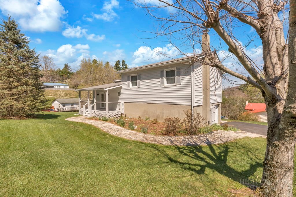 163 Rolling Hill Drive Boone, NC 28607 - Photo 6 of 40 a house view with a outdoor space
