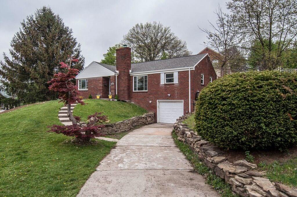 1327 Freeport Road Pittsburgh, PA 15238 - Photo 2 of 25 Mature landscaping and a spacious front yard welcome you home. Plenty of parking for you and your guests.