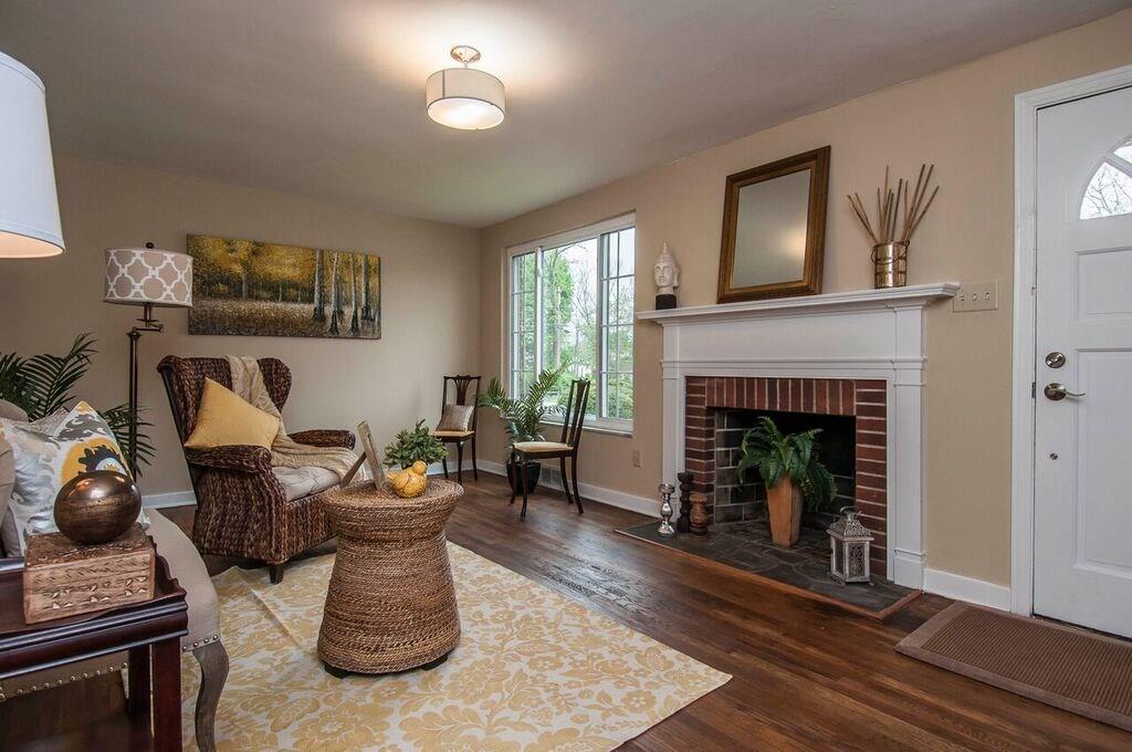 1327 Freeport Road Pittsburgh, PA 15238 - Photo 6 of 25 Original oak hardwood floors and a log burning fireplace with a slate hearth add an easy elegance and comfortable charm.