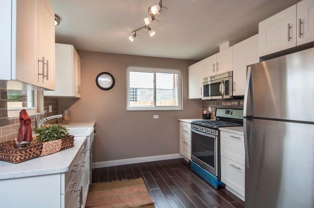 1327 Freeport Road Pittsburgh, PA 15238 - Photo 10 of 25 What a great kitchen! You'll love the low maintenance quartz countertops, new Energy Star stainless steel appliances, crisp white cabinetry and elegant walnut-look tile floors.
