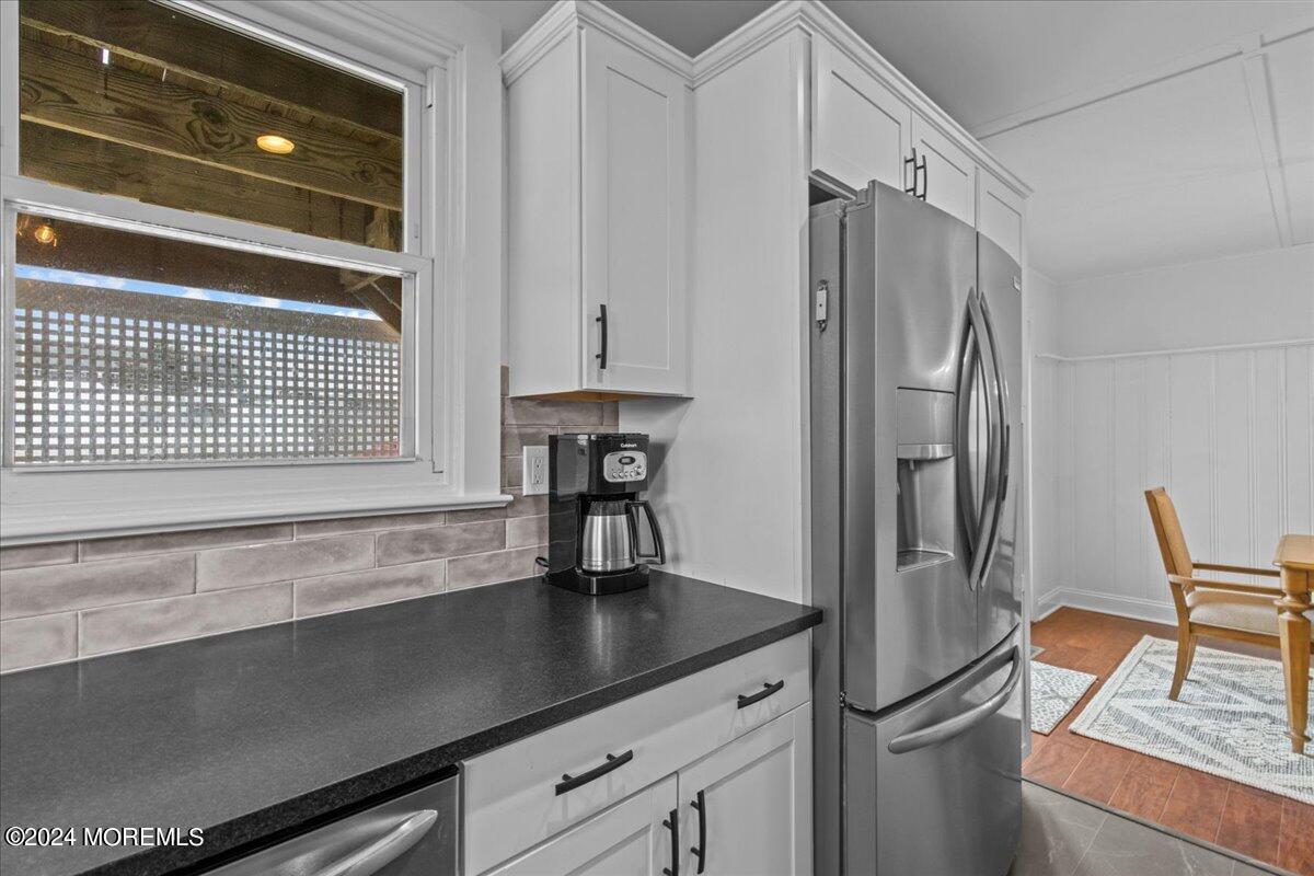 51 3rd Avenue, Unit B WINTER RENTAL Lavallette, NJ 08735 - Photo 13 of 29 a kitchen with a refrigerator and a sink