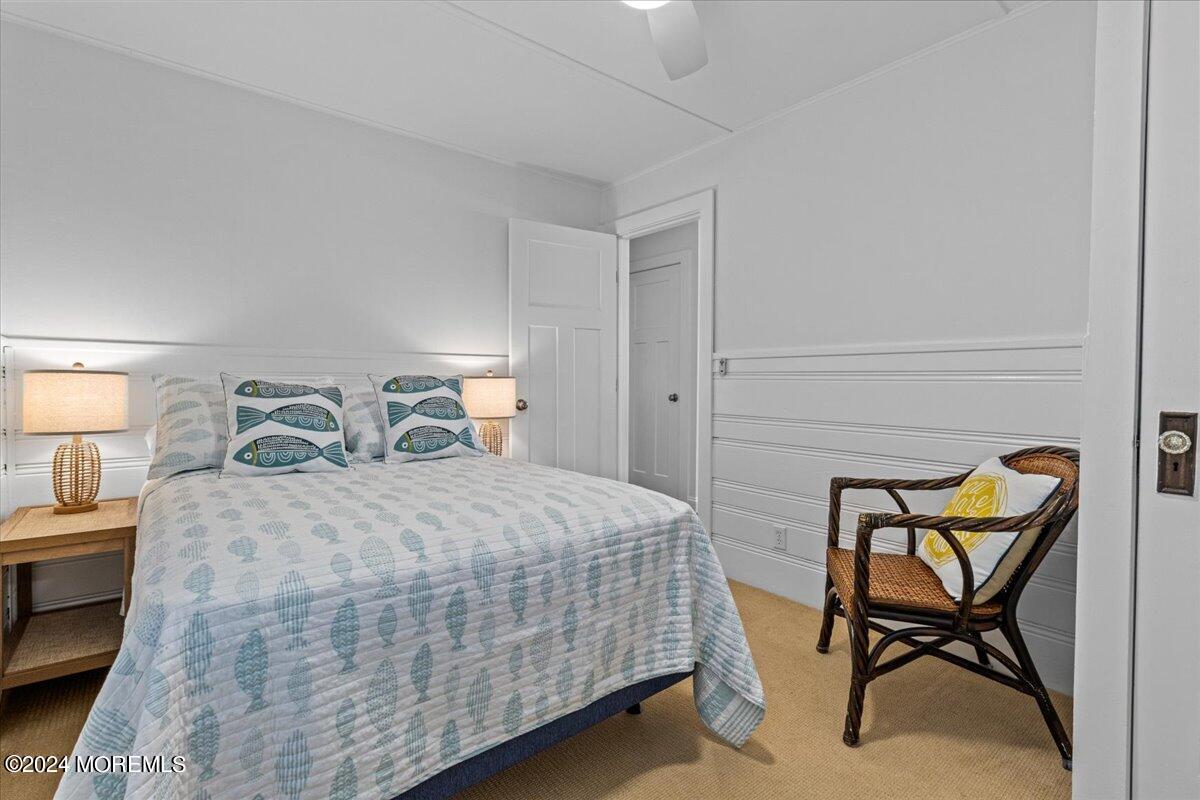 51 3rd Avenue, Unit B WINTER RENTAL Lavallette, NJ 08735 - Photo 16 of 29 a bedroom with a bed chair and window