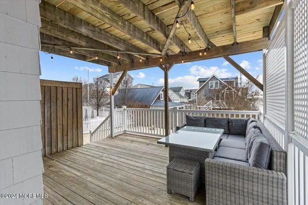 a view of balcony with wooden floor