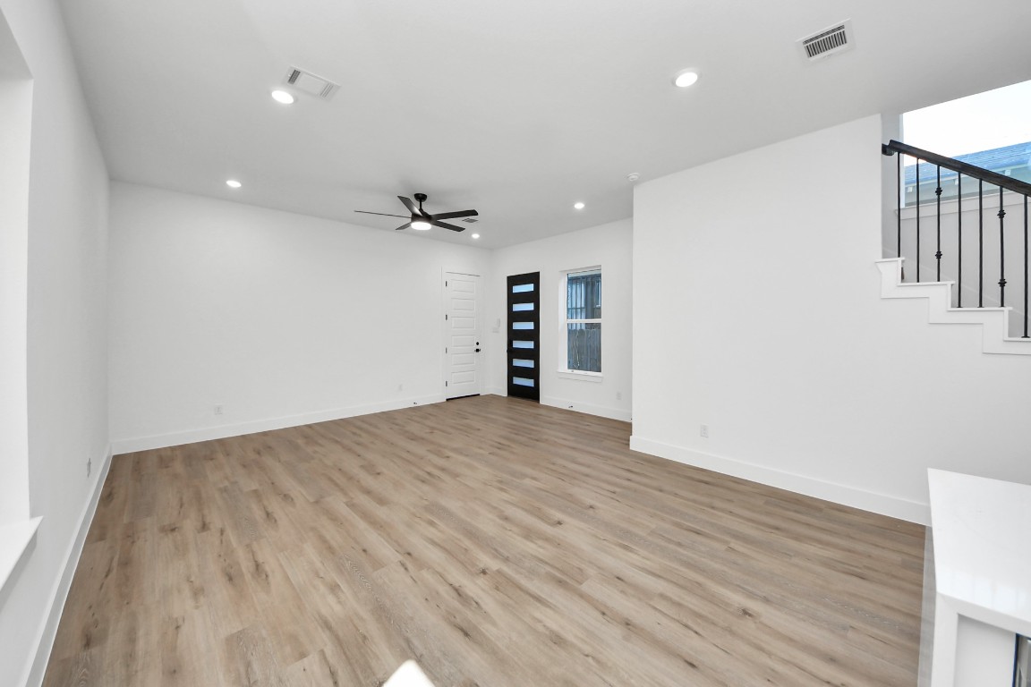 3310 Hardy Street Houston, TX 77009 - Photo 6 of 26 a view of empty room with wooden floor