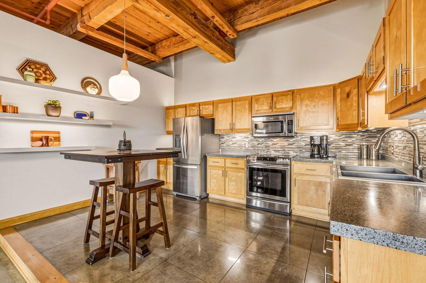 904 East Pearson Street, Unit 501 Milwaukee, WI 53202 - Photo 4 of 31 Rustic Timber Beams