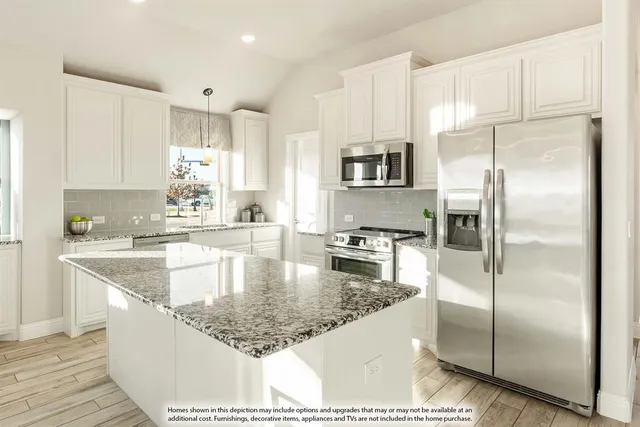 a view of living room with granite countertop furniture and fireplace