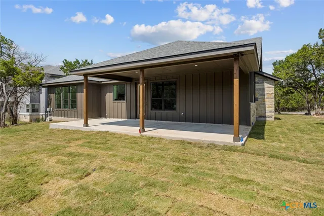 a house with yard in front of it