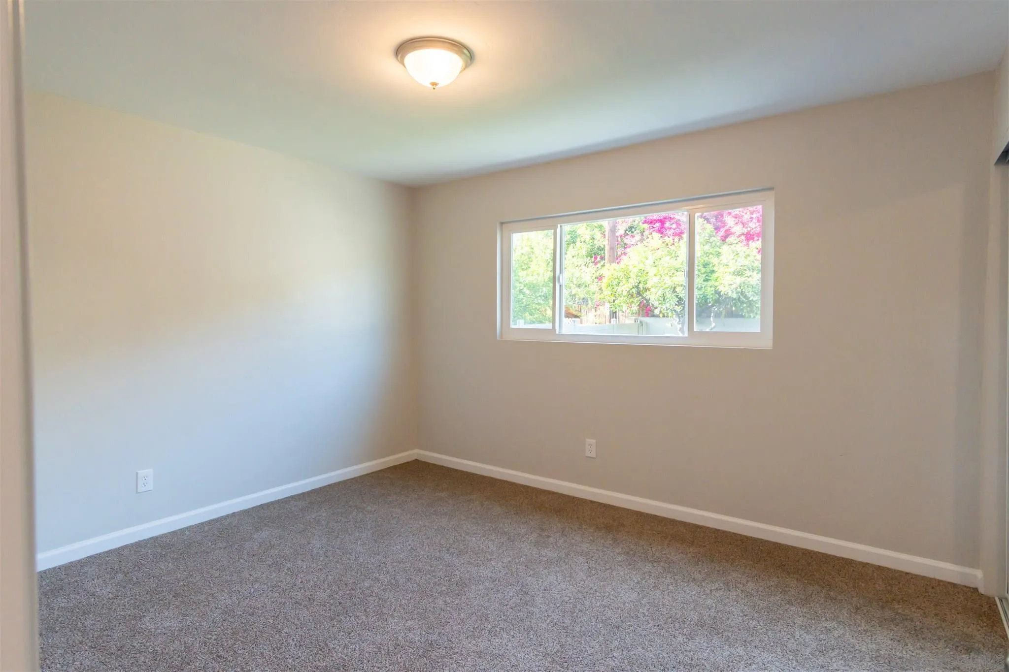 466 Cedar Street El Cajon, CA 92021 - Photo 15 of 26 an empty room with a window