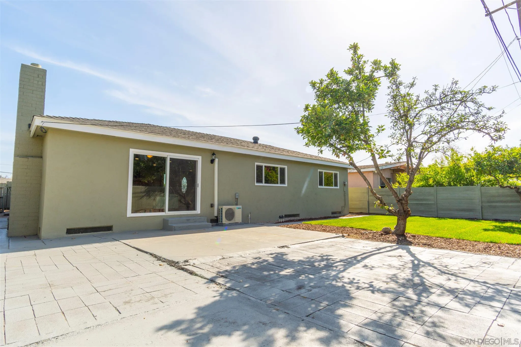 466 Cedar Street El Cajon, CA 92021 - Photo 22 of 26 a front view of a house with a yard