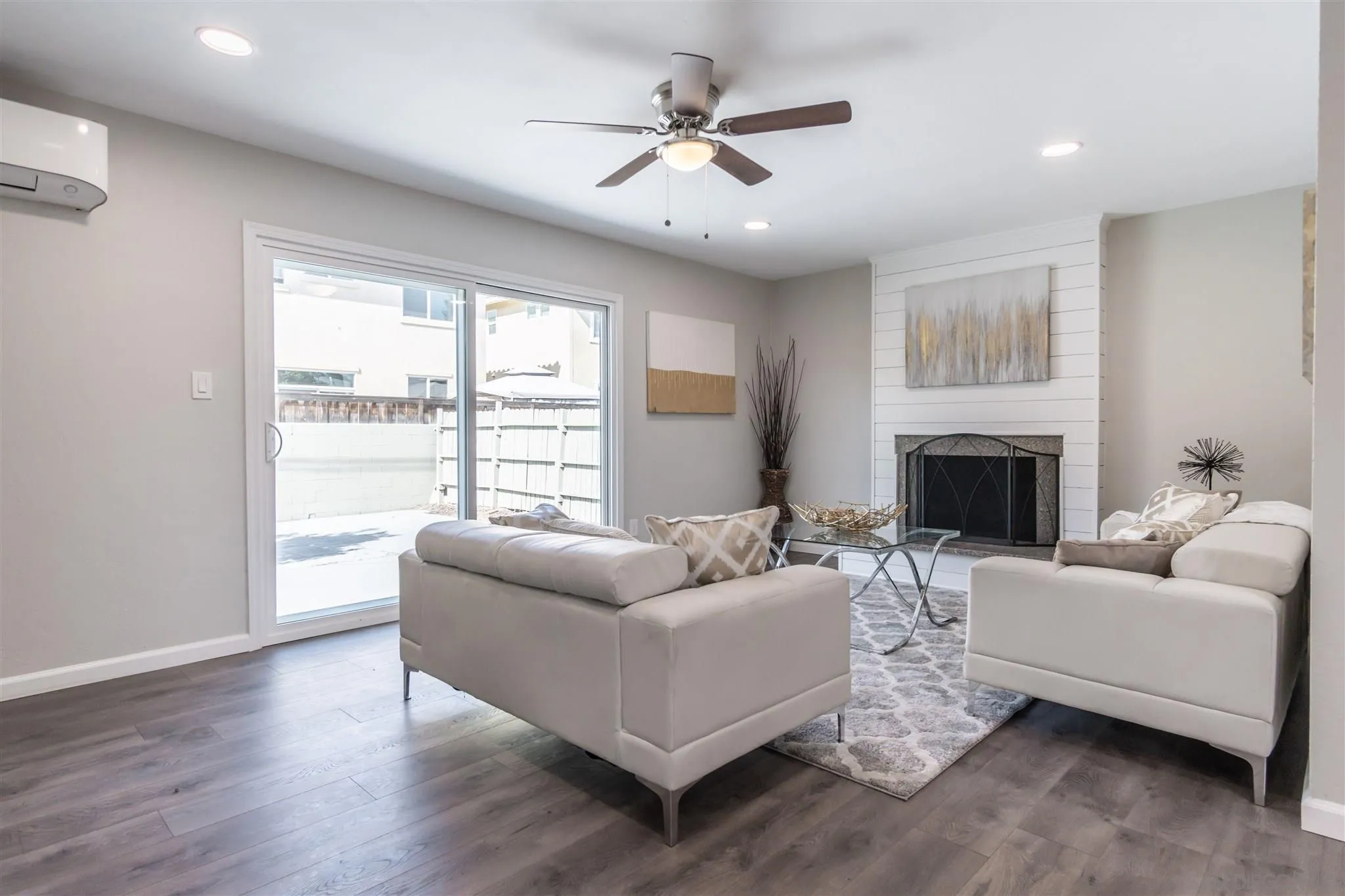 466 Cedar Street El Cajon, CA 92021 - Photo 3 of 26 a living room with furniture and a fireplace