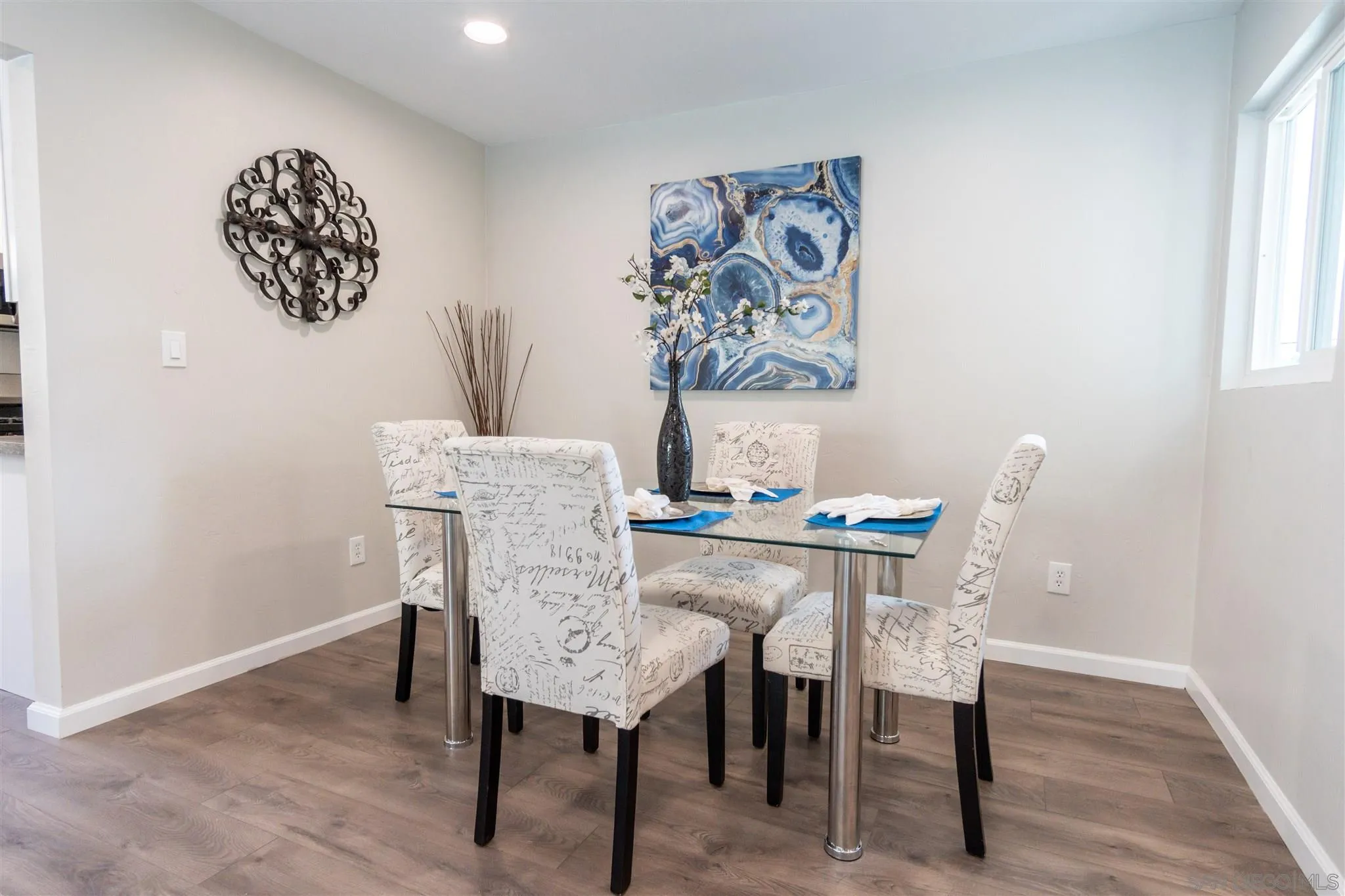 466 Cedar Street El Cajon, CA 92021 - Photo 5 of 26 a view of a dining room with furniture and wooden floor
