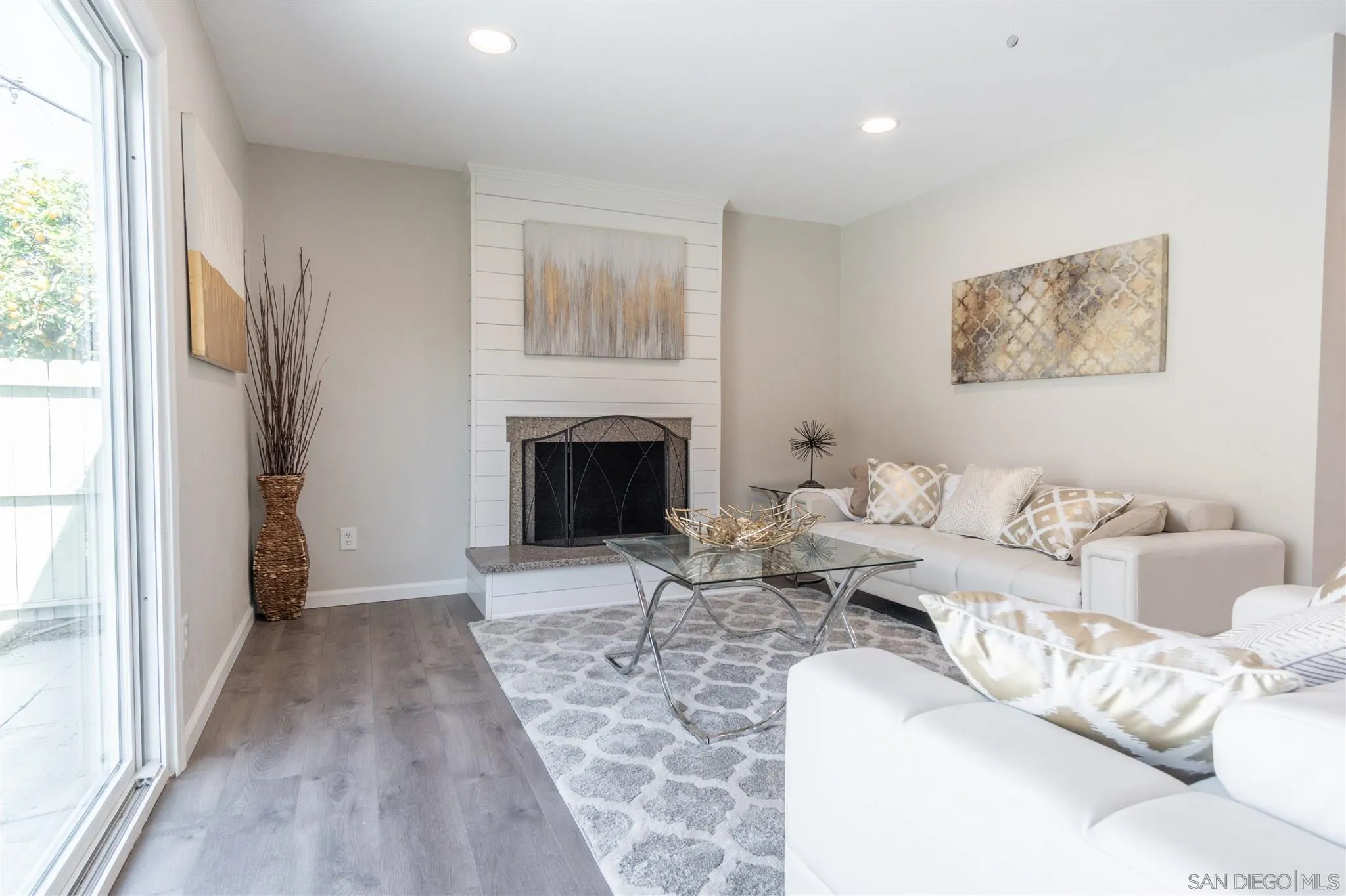 466 Cedar Street El Cajon, CA 92021 - Photo 6 of 26 a living room with furniture large window and a fireplace