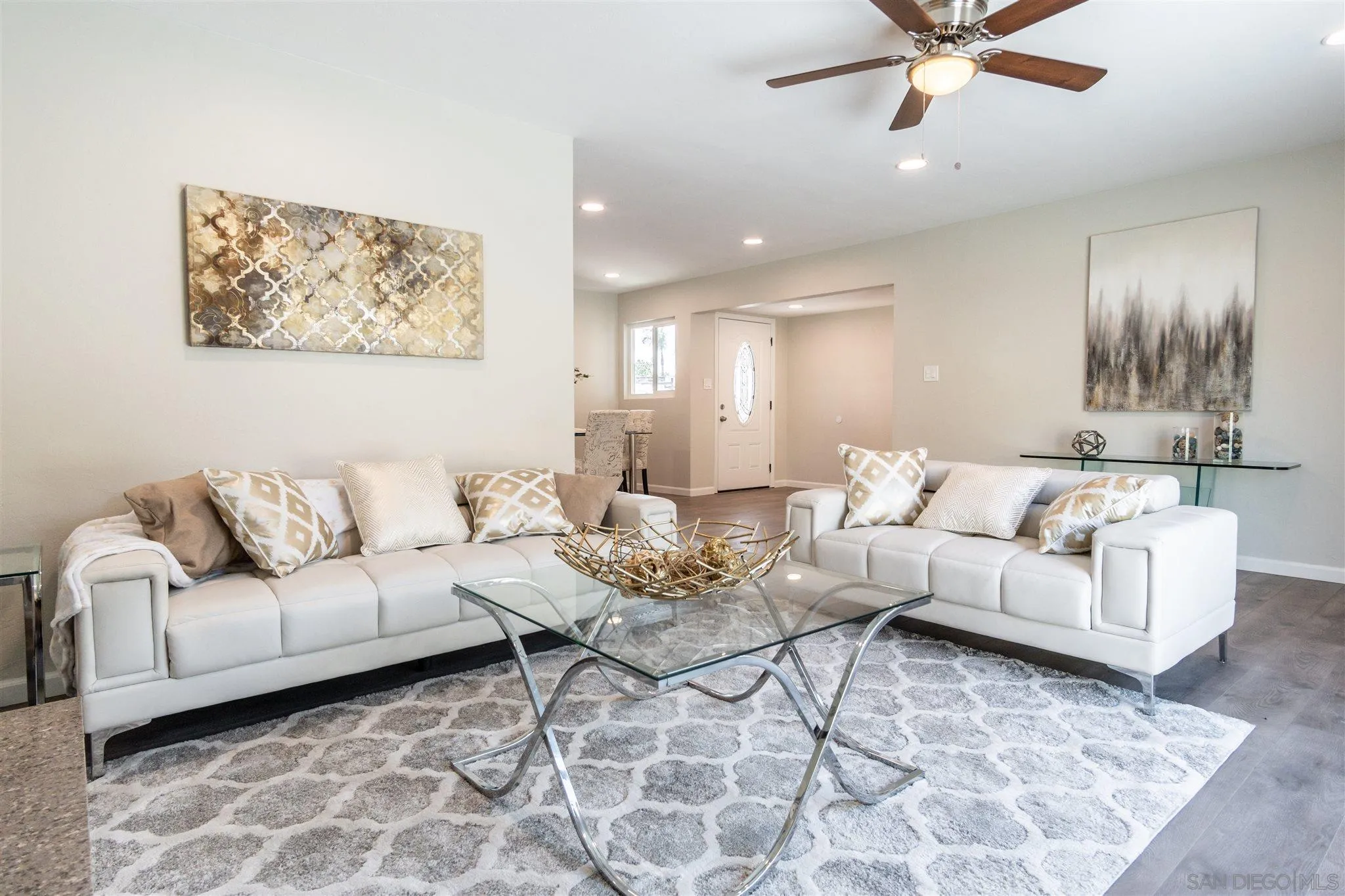 466 Cedar Street El Cajon, CA 92021 - Photo 7 of 26 a living room with furniture and a view of kitchen
