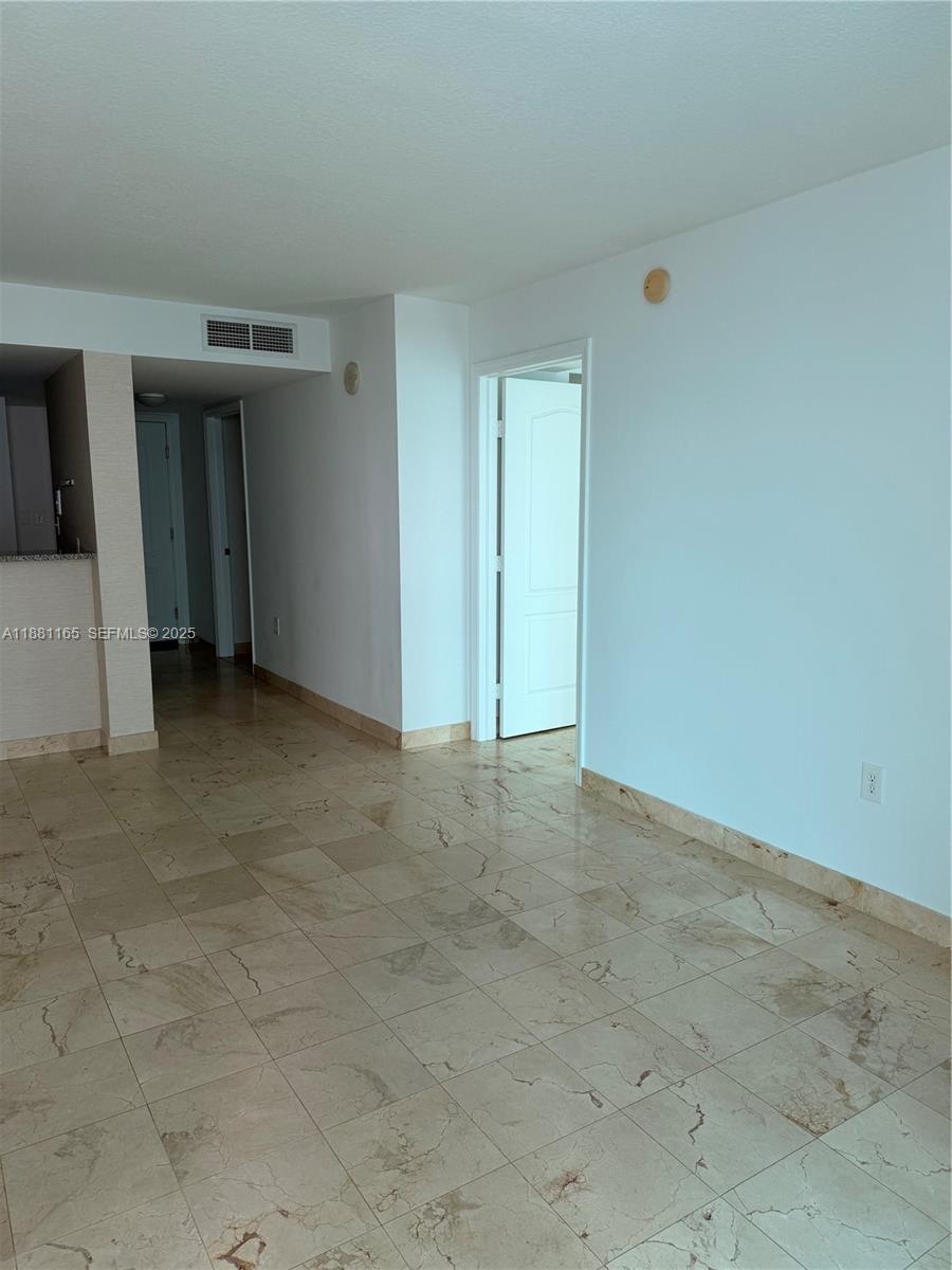 2101 Brickell Avenue, Unit 308 Miami, FL 33129 - Photo 17 of 19 a view of an empty room and fire place