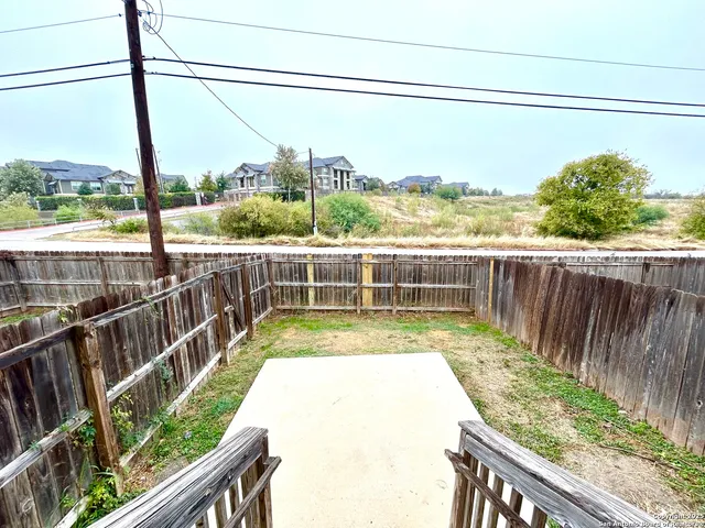 a view of a balcony with city view