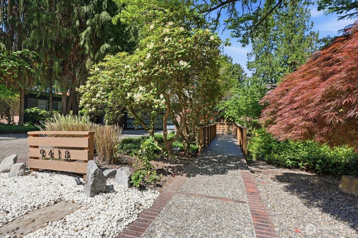 9418 Odin Way Bothell, WA 98011 - Photo 2 of 39 a view of a park with bench and trees