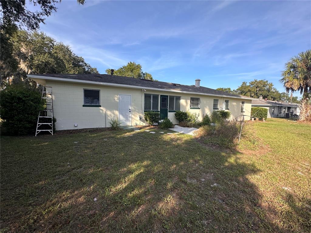 2800 Southland Road Mount Dora, FL 32757 - Photo 2 of 11 a front view of a house with a yard