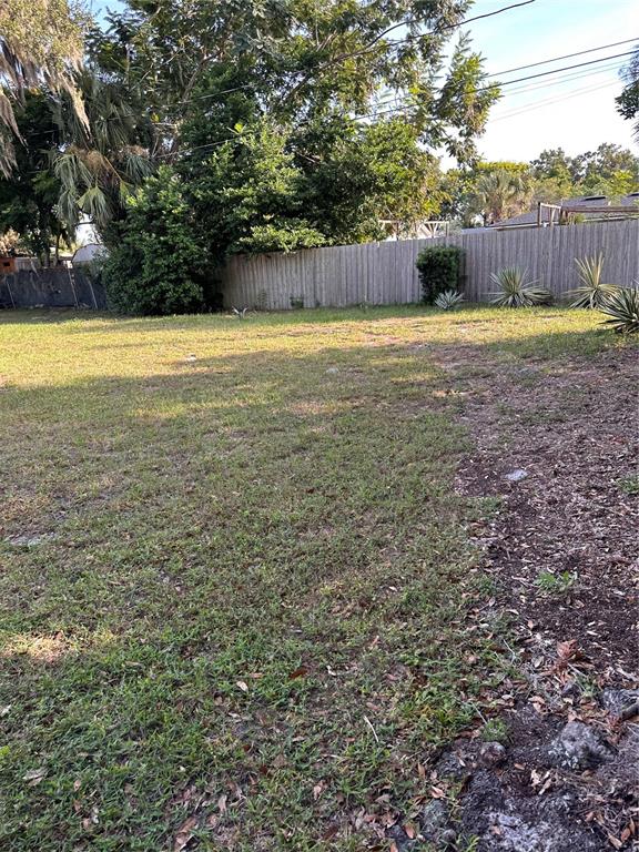 2800 Southland Road Mount Dora, FL 32757 - Photo 3 of 11 a view of a yard with a trampoline