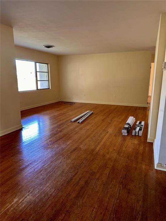 2800 Southland Road Mount Dora, FL 32757 - Photo 4 of 11 a view of wooden floor and windows in a room