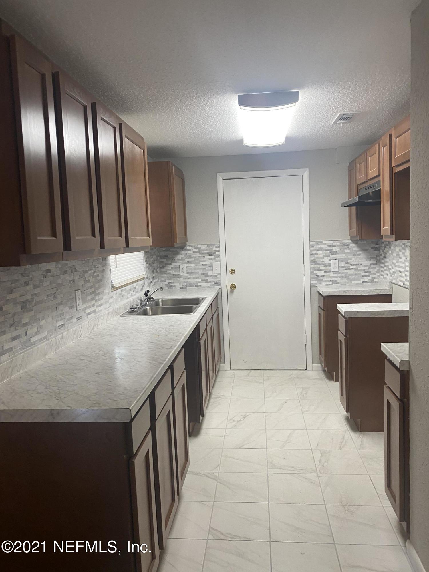 9042 Sibbald Road Jacksonville, FL 32208 - Photo 4 of 9 IMG_6574