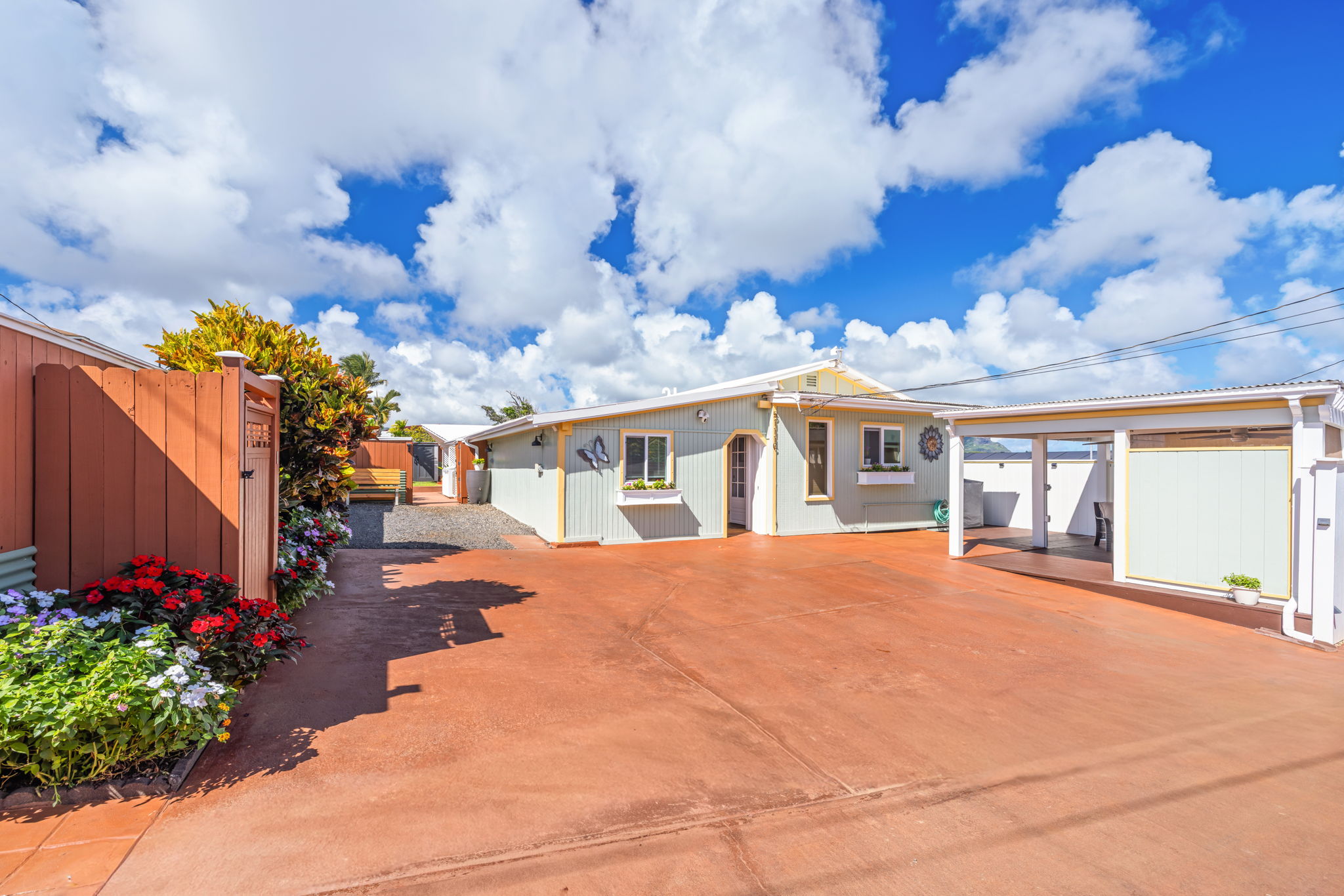 a front view of a house with a yard and a garage