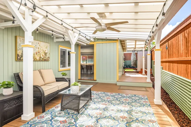 a living room with furniture and a table