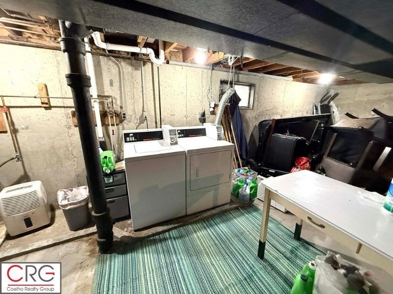 45 North Emerson Street, Unit 1 Wakefield, MA 01880 - Photo 12 of 12 a utility room with cabinets