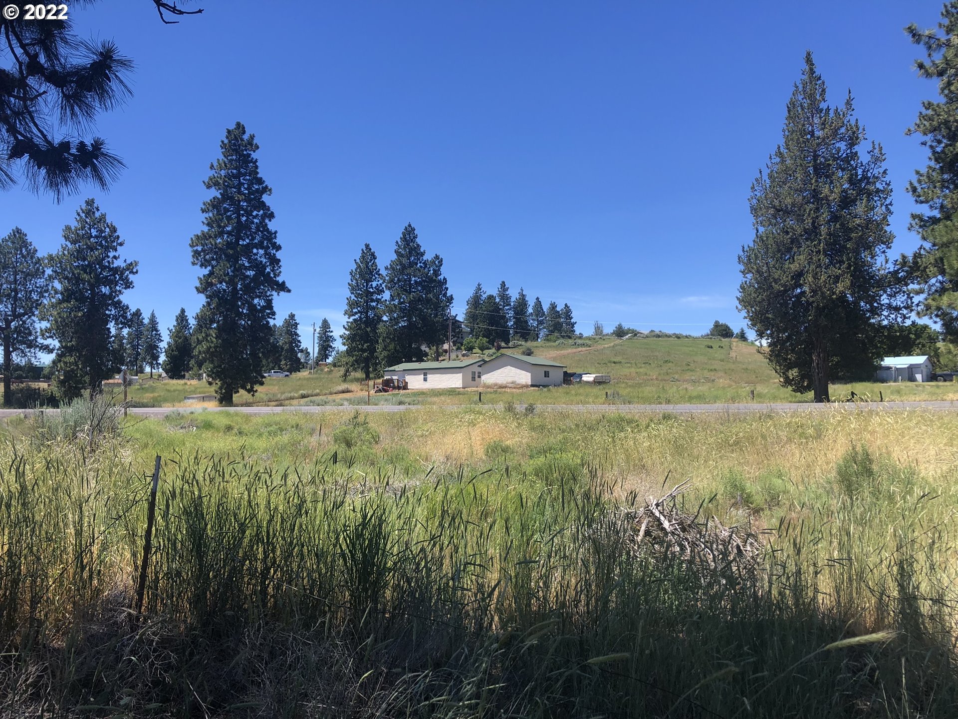 a view of outdoor space with mountain view