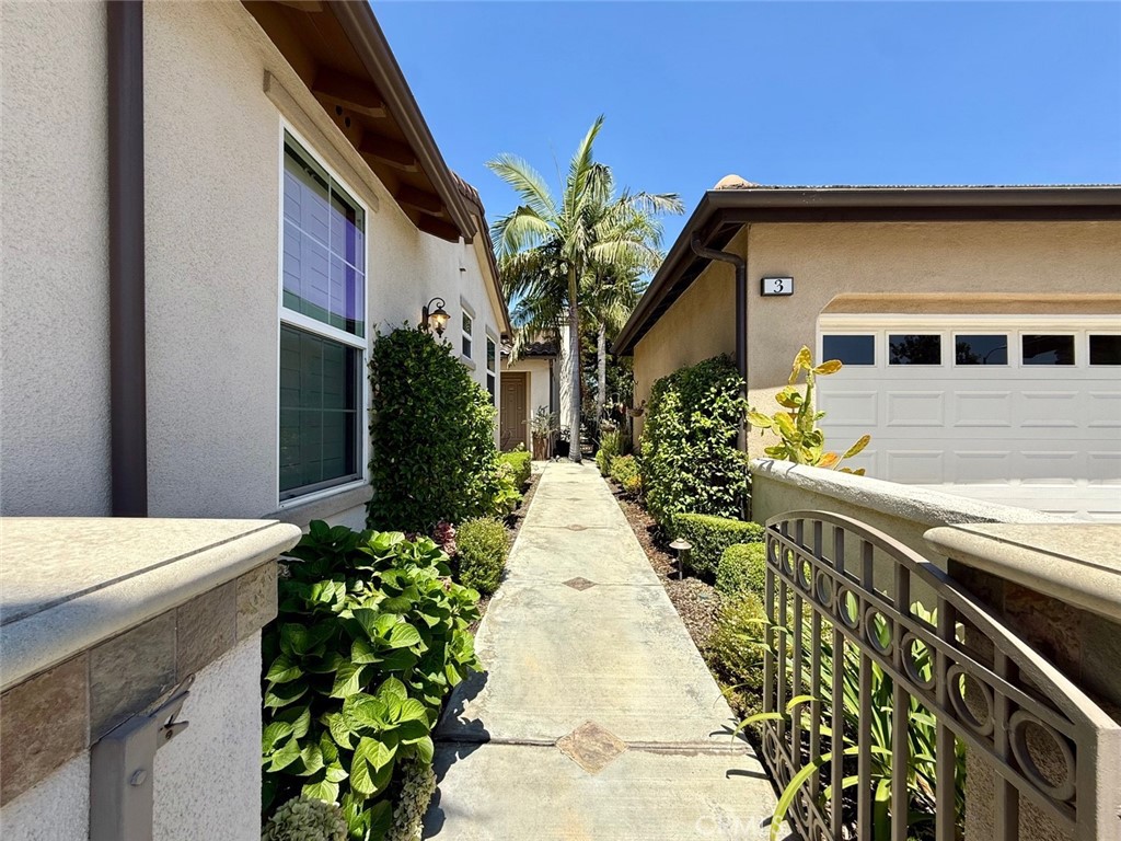 1 Stonegate Irvine, CA 92602 - Photo 2 of 36 a front view of a house with a yard