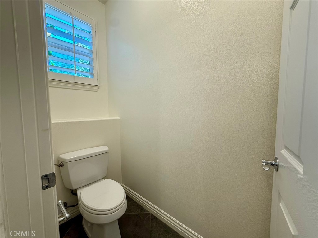 1 Stonegate Irvine, CA 92602 - Photo 28 of 36 a bathroom with a toilet