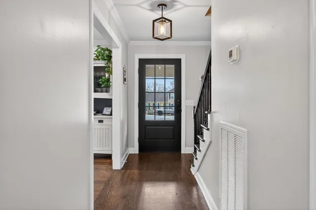 a room with furniture and wooden floor