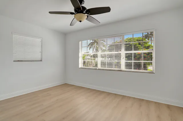 a view of an empty room and window