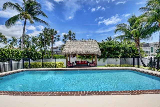 a view of a city with palm trees