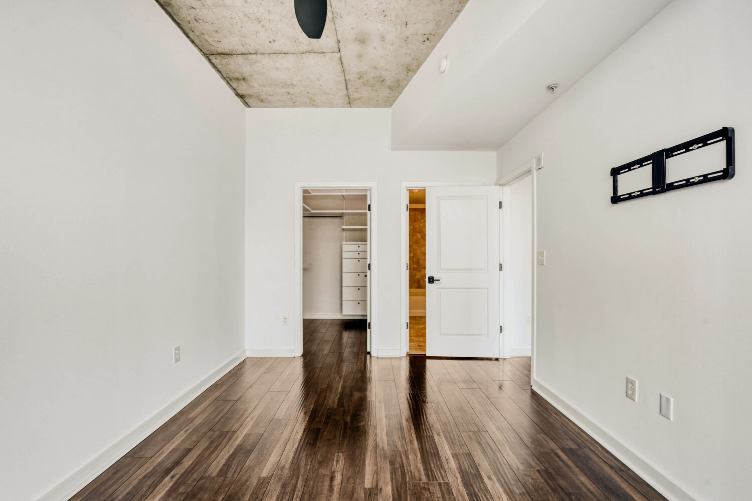 360 Nueces Street, Unit 2004 Austin, TX 78701 - Photo 27 of 34 a view of hallway with wooden floor