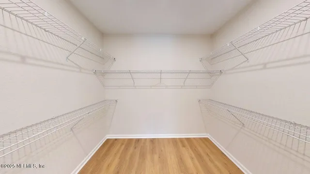a view of a room with racks on the wall
