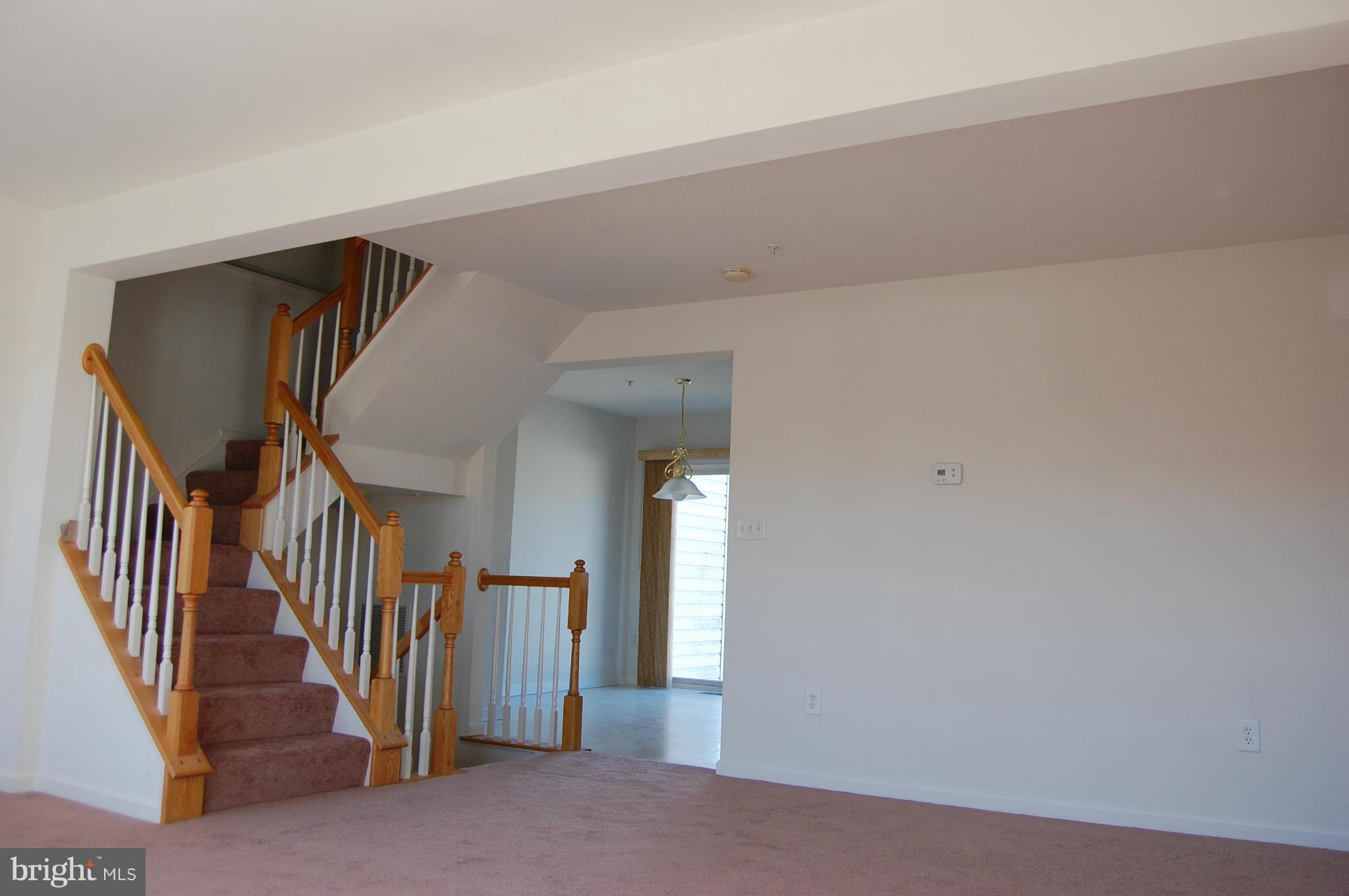 7636 Fairbrook Road Baltimore, MD 21244 - Photo 10 of 19 Large Living Room directly off of Kitchen